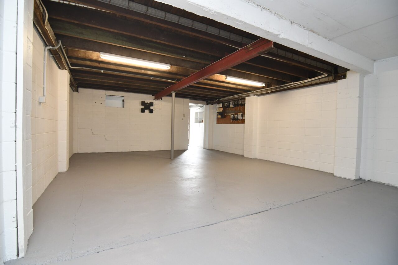 Ground-floor storage — approx. 40 sqm secure storage with roller door access